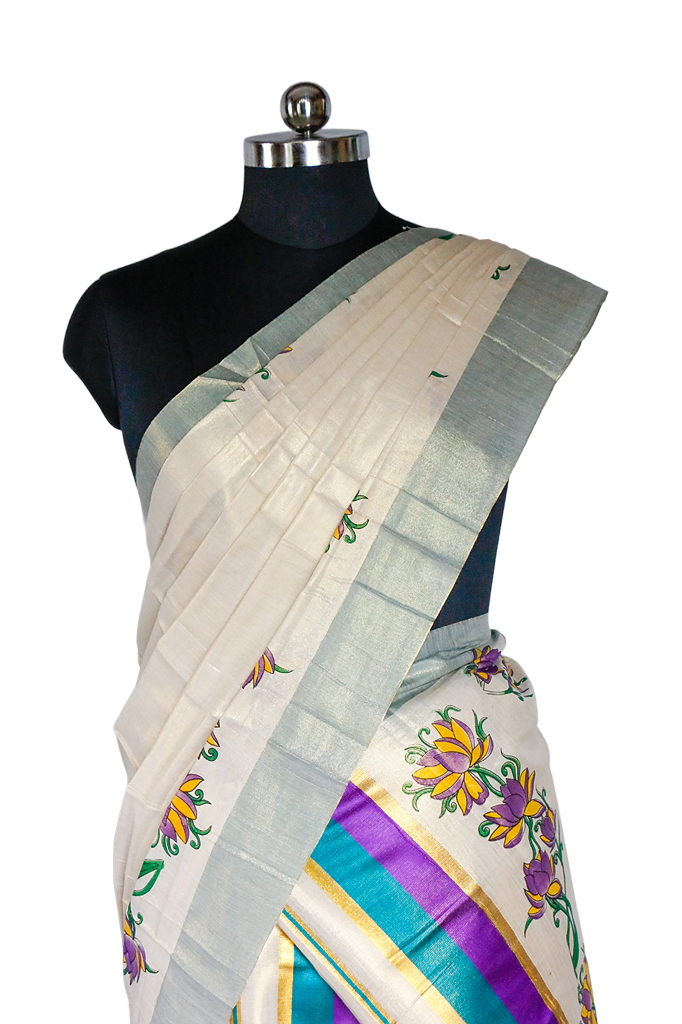 Saree with floral patterns on a mannequin against a white background